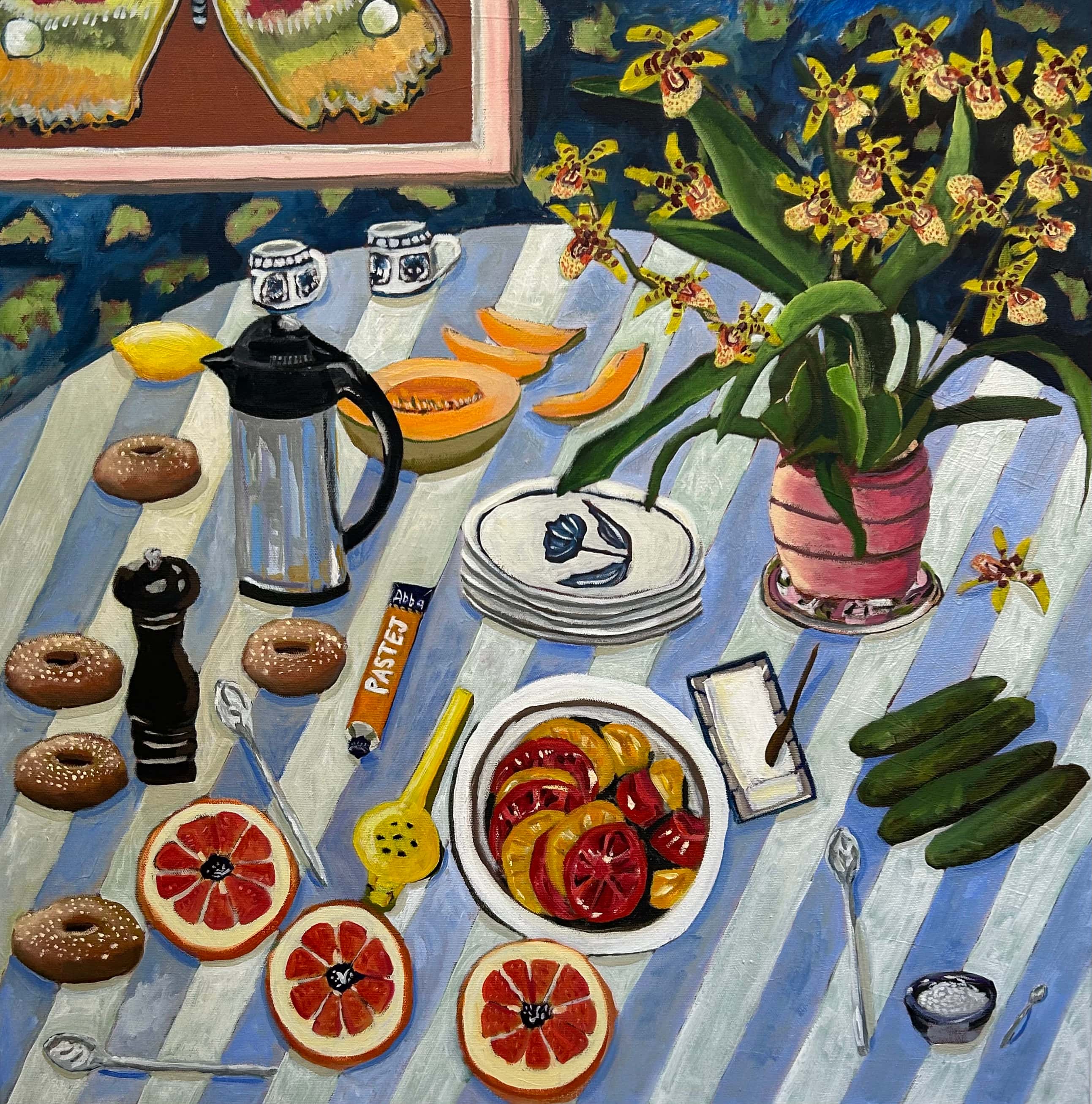 table with plate of tomatoes